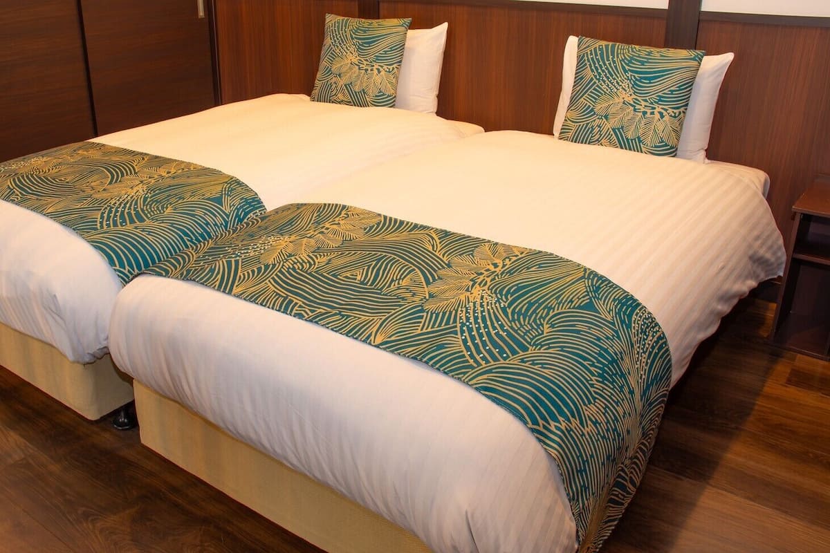 1 Schlafzimmer, hochwertige Bettwaren, Daunenbettdecken