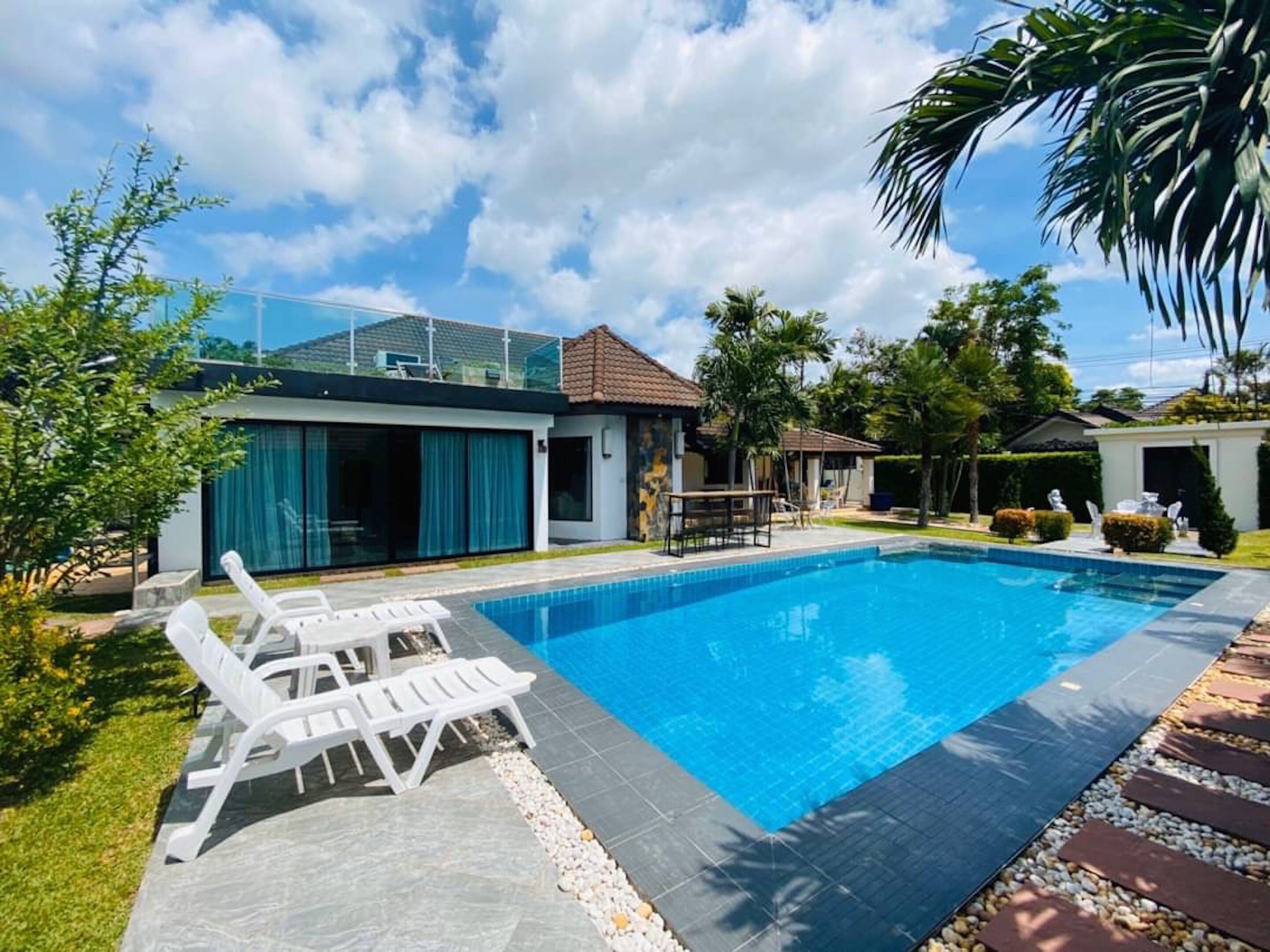 Outdoor pool, pool umbrellas, pool loungers