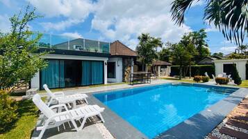 Outdoor pool, pool umbrellas, pool loungers