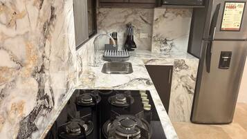 Apartment, 2 Bedrooms | Private kitchen | Full-sized fridge, microwave, oven, stovetop