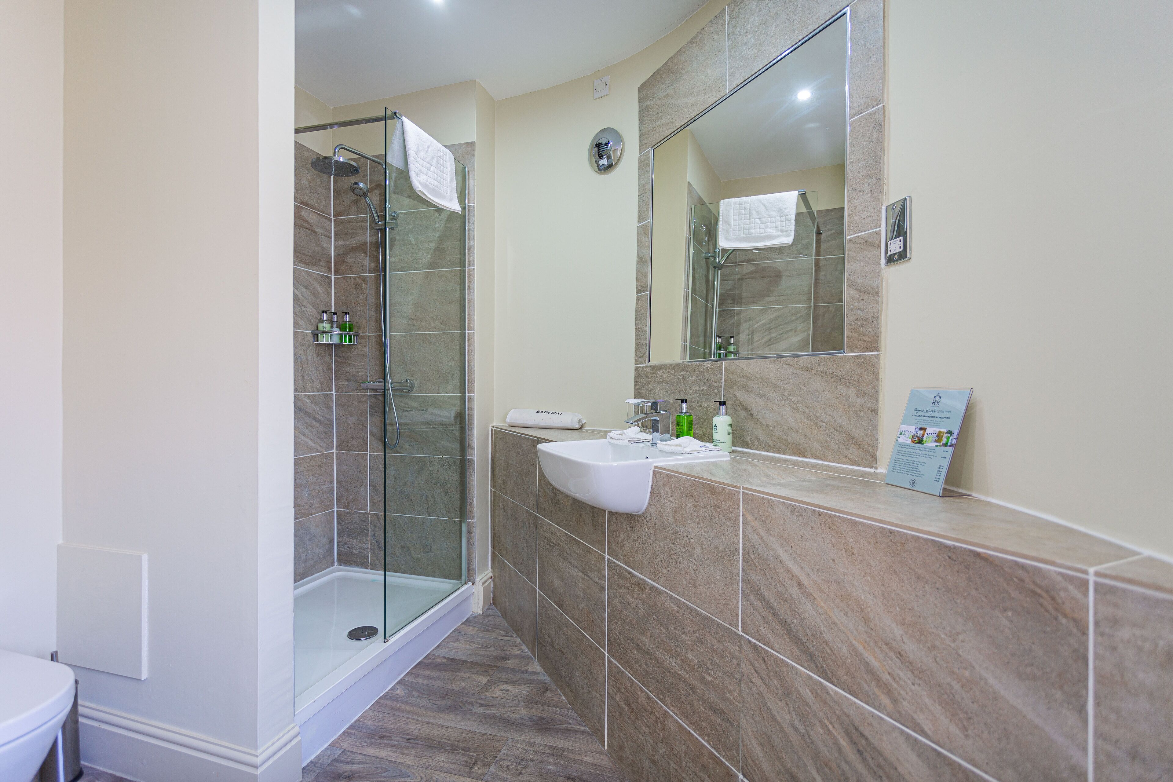 deluxe family room | bathroom | free toiletries, hair dryer, bathrobes, slippers