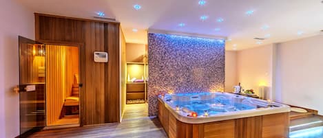 Een sauna, een bubbelbad, warm/mineraalwaterbronnen