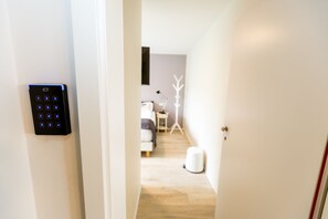 Quarto triplo, banheiro privativo | Cortinas blackout, berços grátis, Wi-Fi de cortesia, roupa de cama
