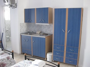 Studio, Sea View | Private kitchenette | Fridge, stovetop, coffee/tea maker, electric kettle