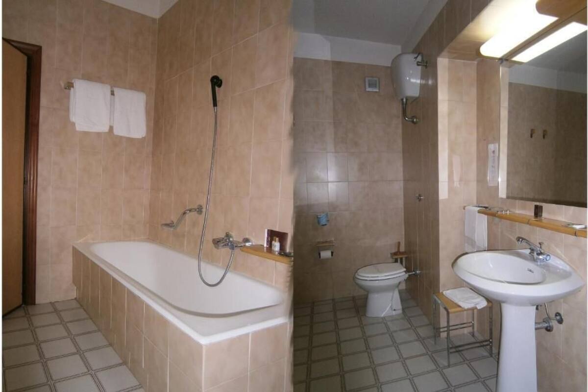 rainfall showerhead, hair dryer, dressing gowns, slippers