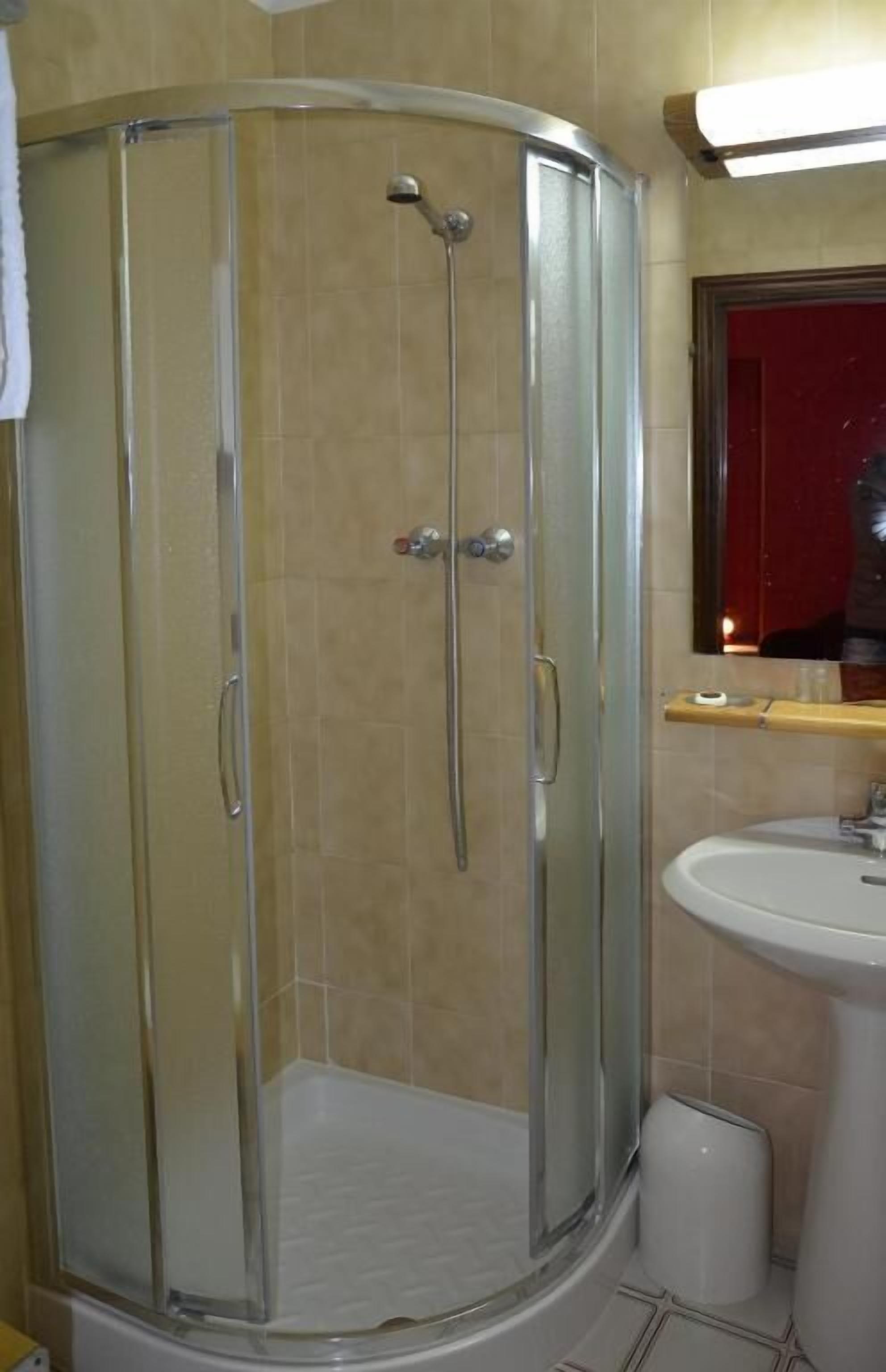 rainfall showerhead, hair dryer, dressing gowns, slippers