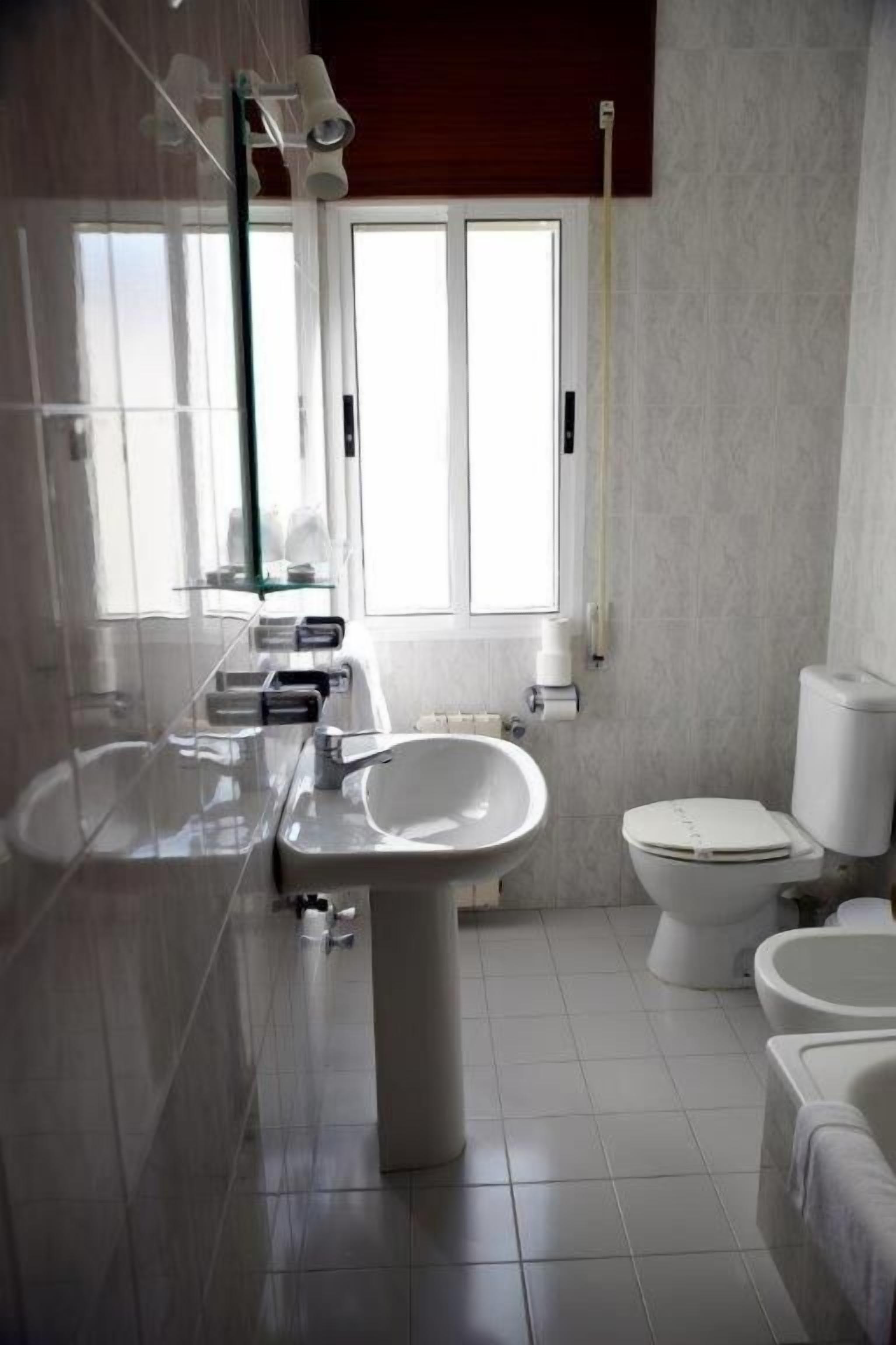 free toiletries, hair dryer, bidet, towels