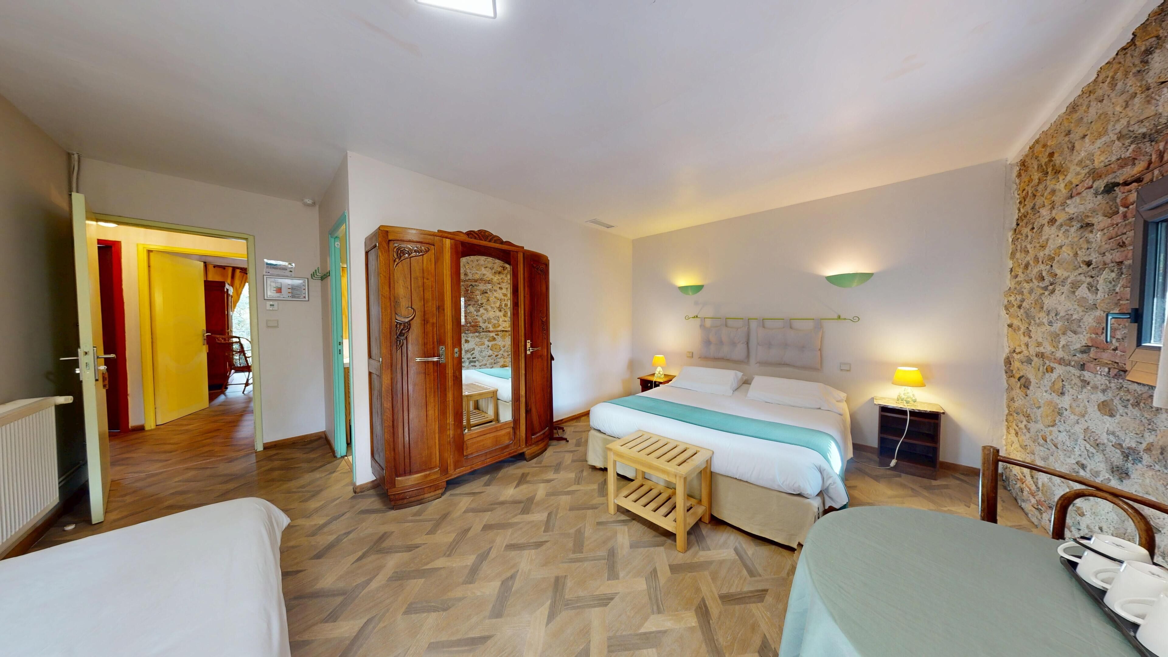 Comfort Triple Room, Private Bathroom, Garden View (La chambre verte) | Individually decorated, individually furnished, desk, blackout drapes