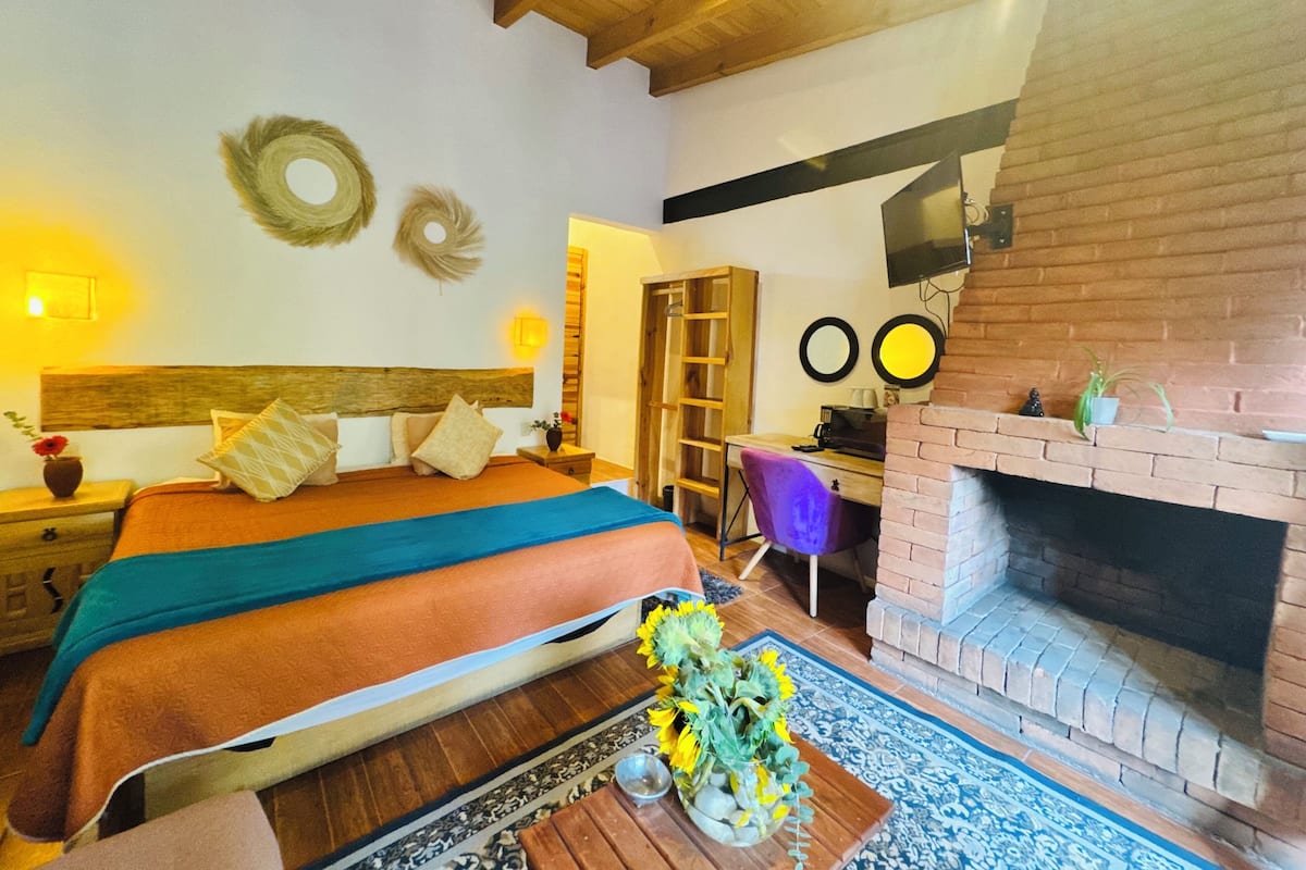 Superior Room, Fireplace | Desk, laptop workspace, bed sheets