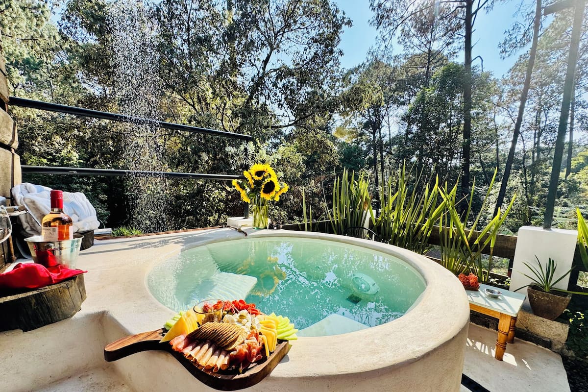 Family Room, Garden View | Private spa tub
