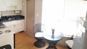 Suite, 1 Queen Bed, Non Smoking, Pool View | Private kitchen | Fridge, microwave, coffee/tea maker