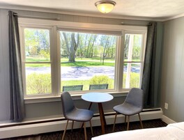 Blackout drapes, iron/ironing board, free cribs/infant beds