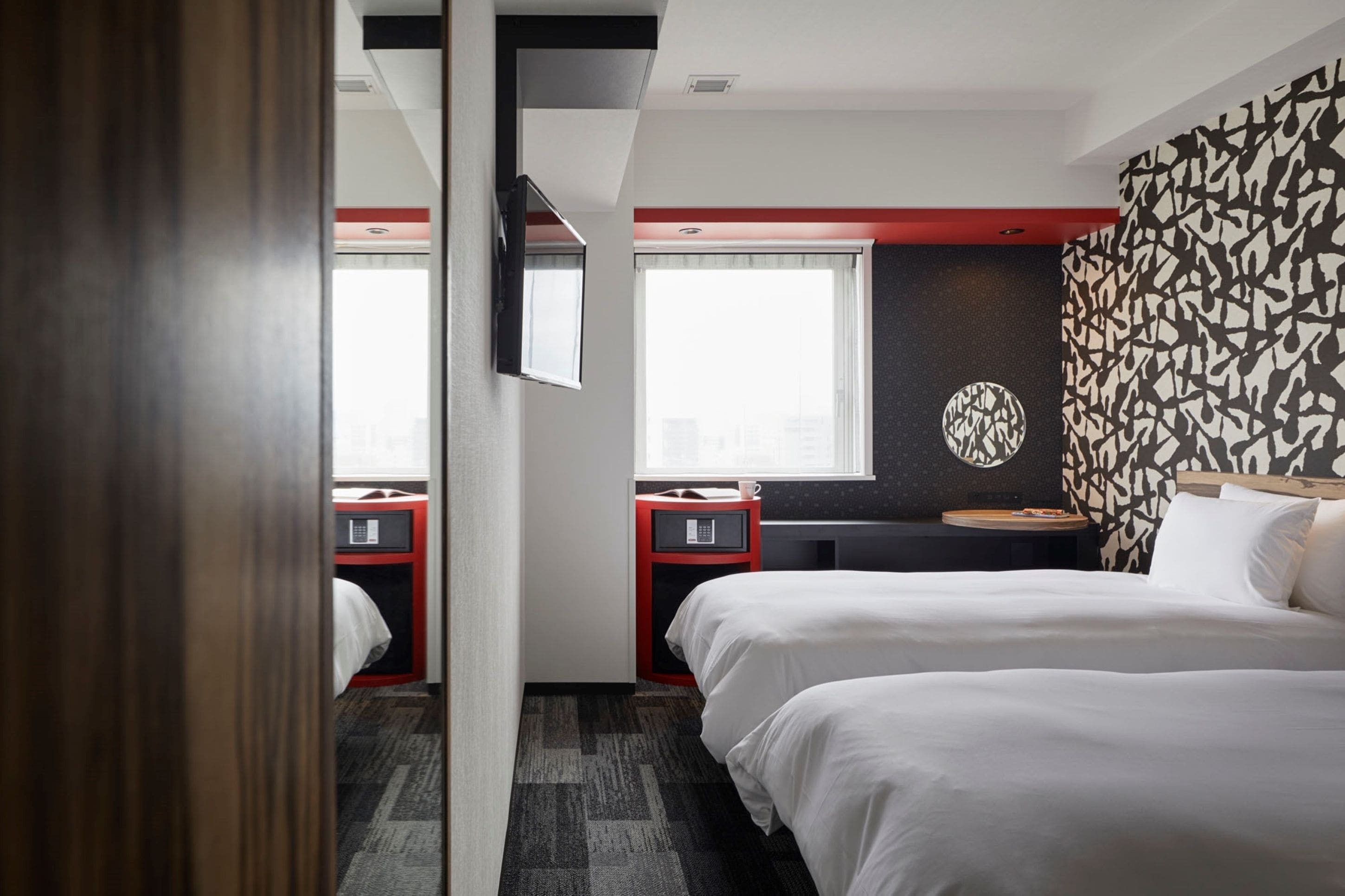 Habitación superior con 2 camas individuales, para no fumadores | Caja de seguridad en la habitación, cortinas blackout y insonorización 