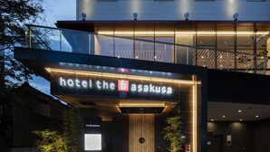 A modern hotel entrance with a prominent sign reading "hotel the b asakusa." - the b asakusa (Tokyo)