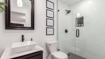 Shower, hair dryer, towels