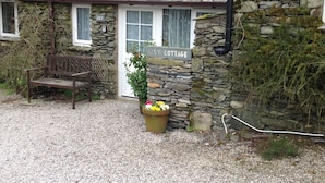 A stone cottage with a sign reading "Lily Cottage." - Lily cottage In An Idyllic Riverside Location, Lake District Nation Park. (Selside Kendal,)