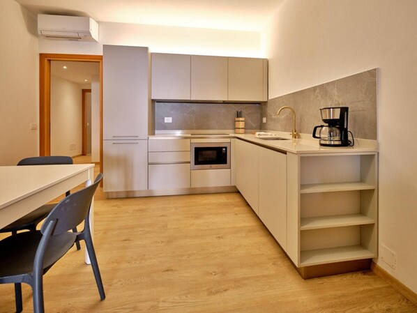 Microwave, stovetop, coffee/tea maker