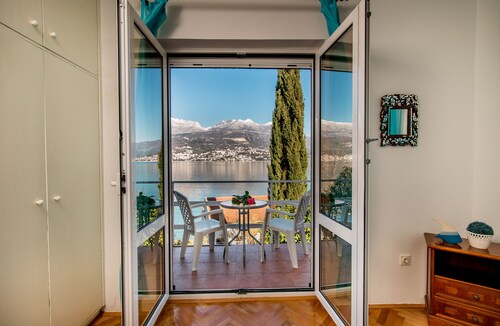 Beautiful shoreline holiday home with private mooring, Njivice, Montenegro