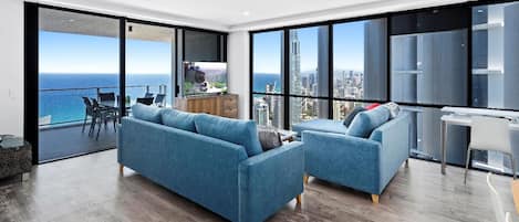 Lvl 45 Designer Apartment, 2 Bedrooms, 2 Bathrooms, Ocean View | Living area | 65-inch Smart TV with digital channels, TV, Netflix