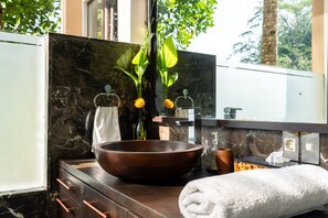 Combined shower/tub, hair dryer, towels, soap
