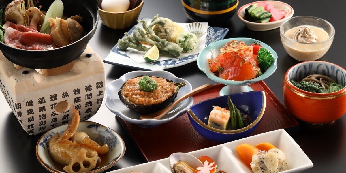 A variety of Japanese dishes arranged on a table.