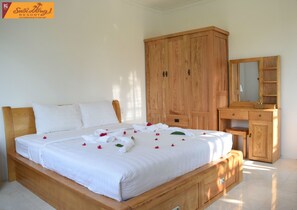 Deluxe Double Room, Garden View | Minibar, desk, free WiFi, bed sheets - Suoi Hong Resort (Phan Thiet)