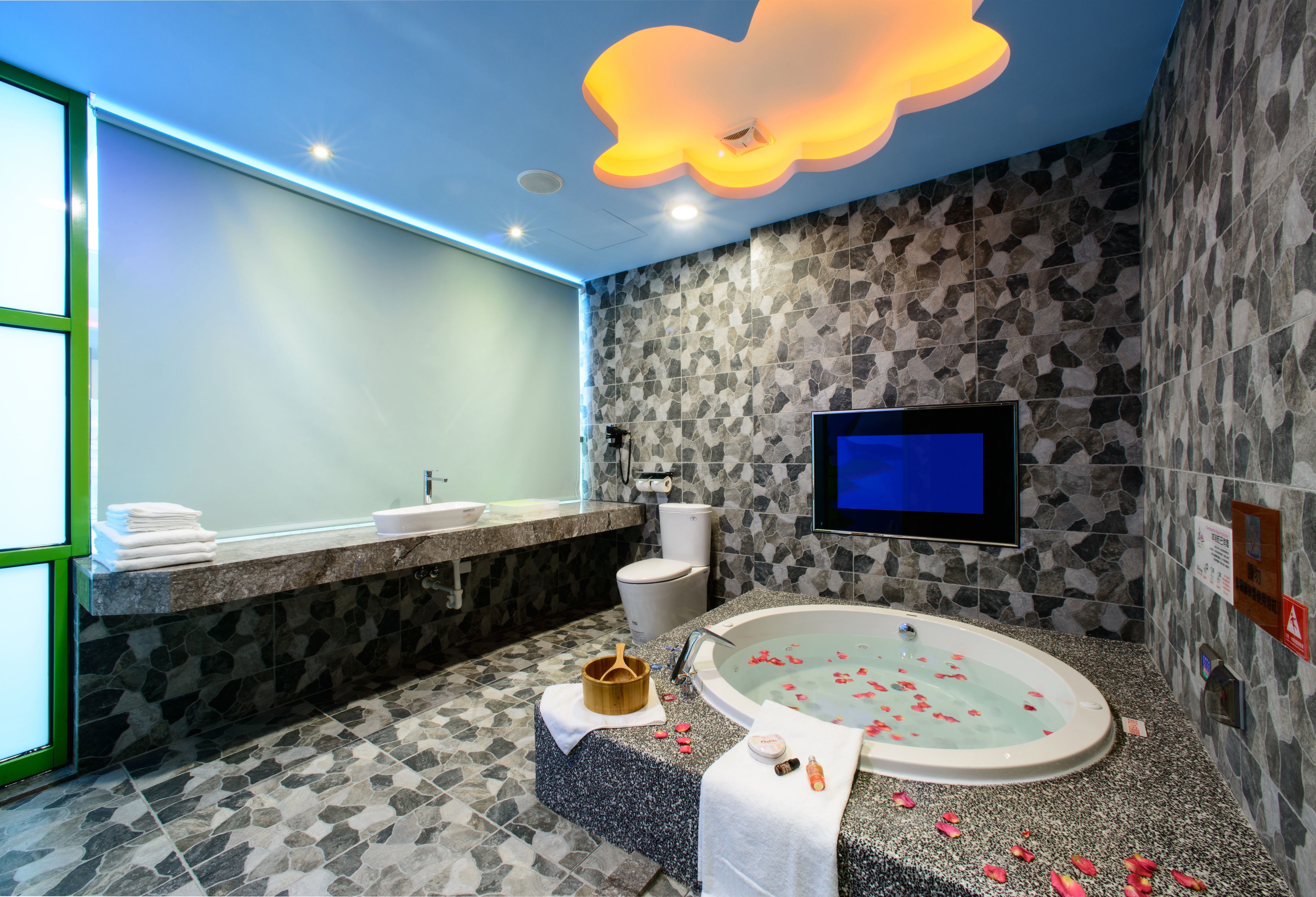 dinosaur themed family room | premium bedding, minibar, desk, blackout curtains