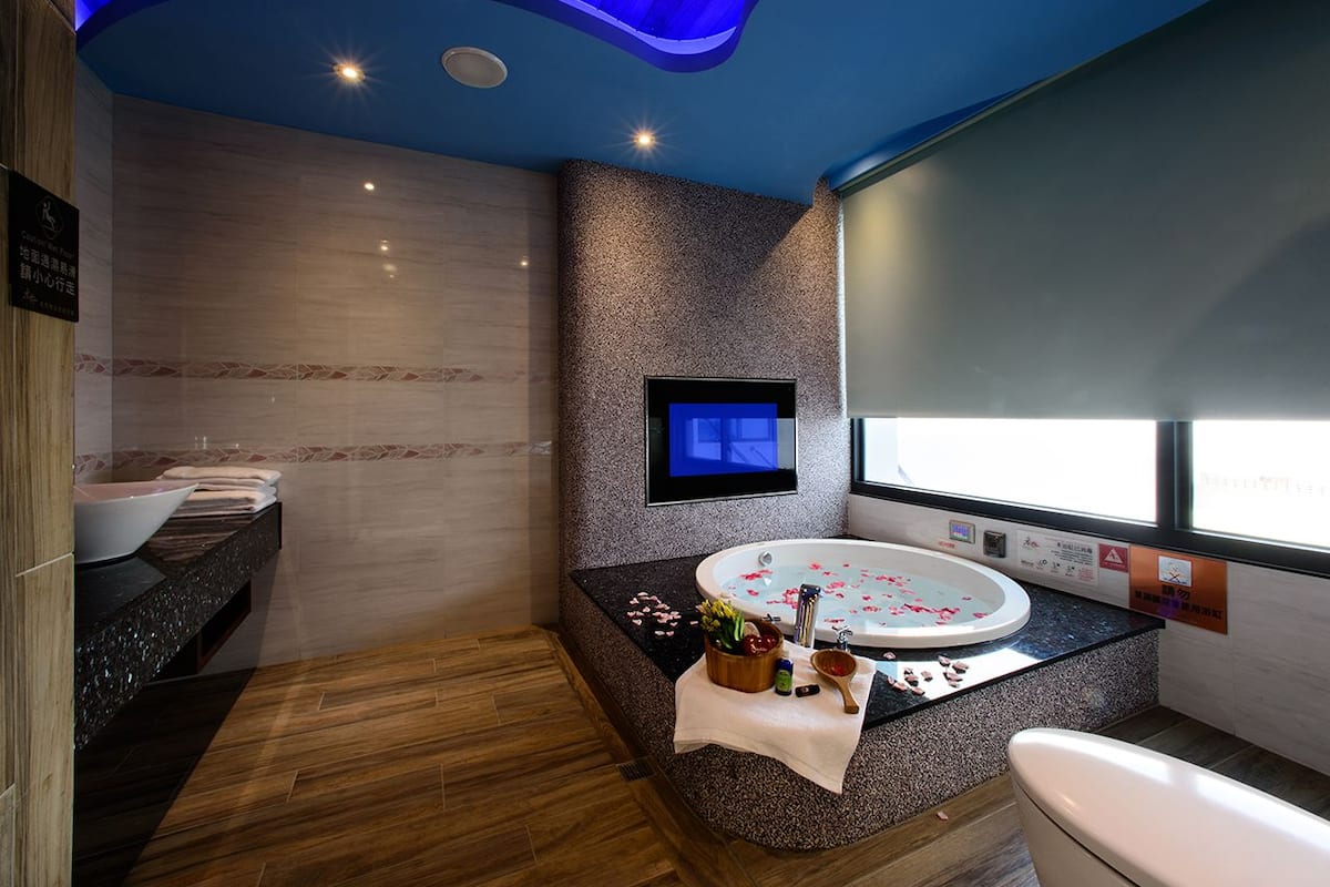 cute animals themed family room | bathroom | free toiletries, hair dryer, slippers, towels