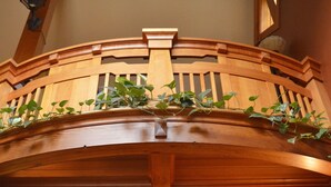 A wooden staircase with a railing, leading to an upper level. - The Trail's Edge / "Captain's Quarters" Is A Gorgeous Retreat, In Any Season.  (Duluth)