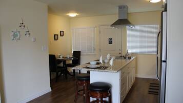 Microwave, dishwasher, coffee/tea maker, cookware/dishes/utensils