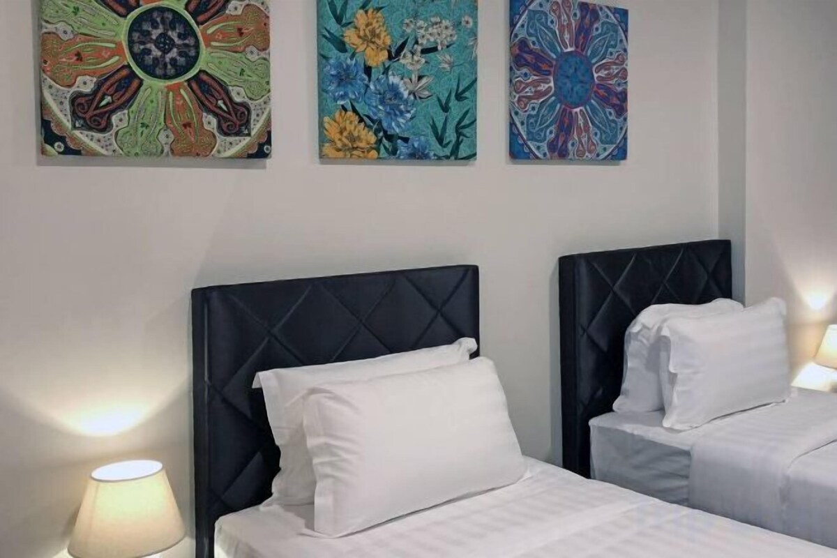 In-room safe, desk, iron/ironing board (on request), cribs (surcharge)