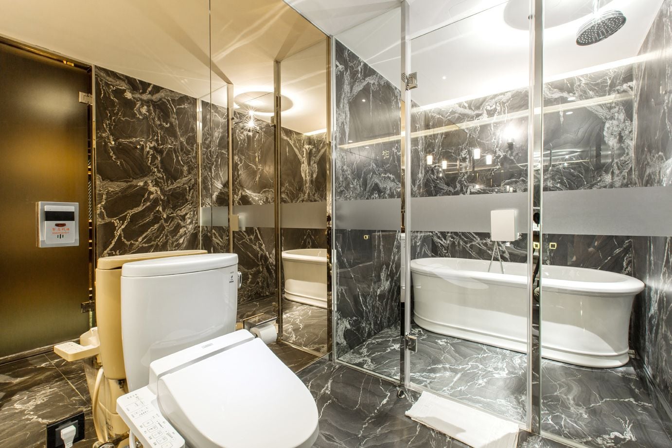 family room | bathroom | separate bathtub and shower, rainfall showerhead, hair dryer, slippers