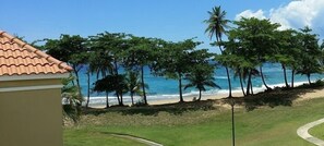 On the beach, sun loungers, beach towels