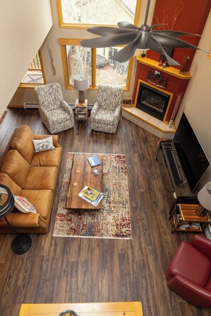 Smart TV, fireplace, DVD player, books