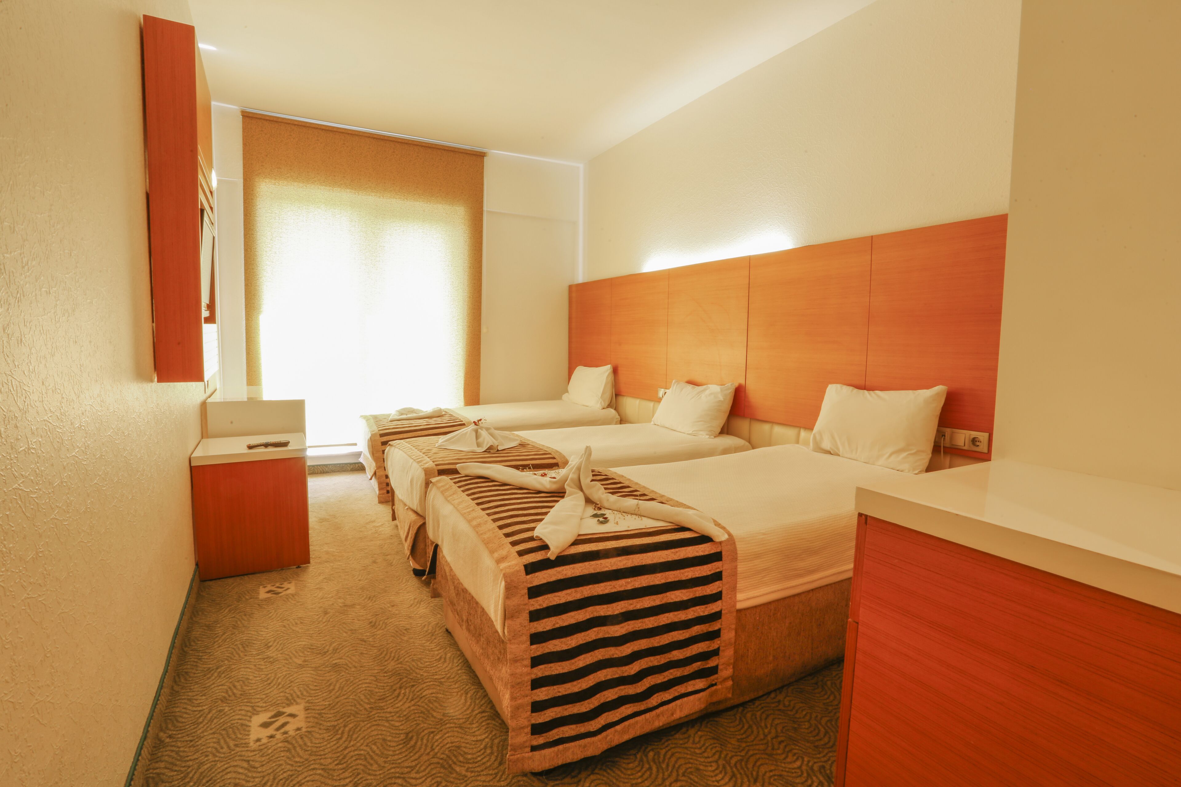 economy triple room | premium bedding, minibar, desk, soundproofing
