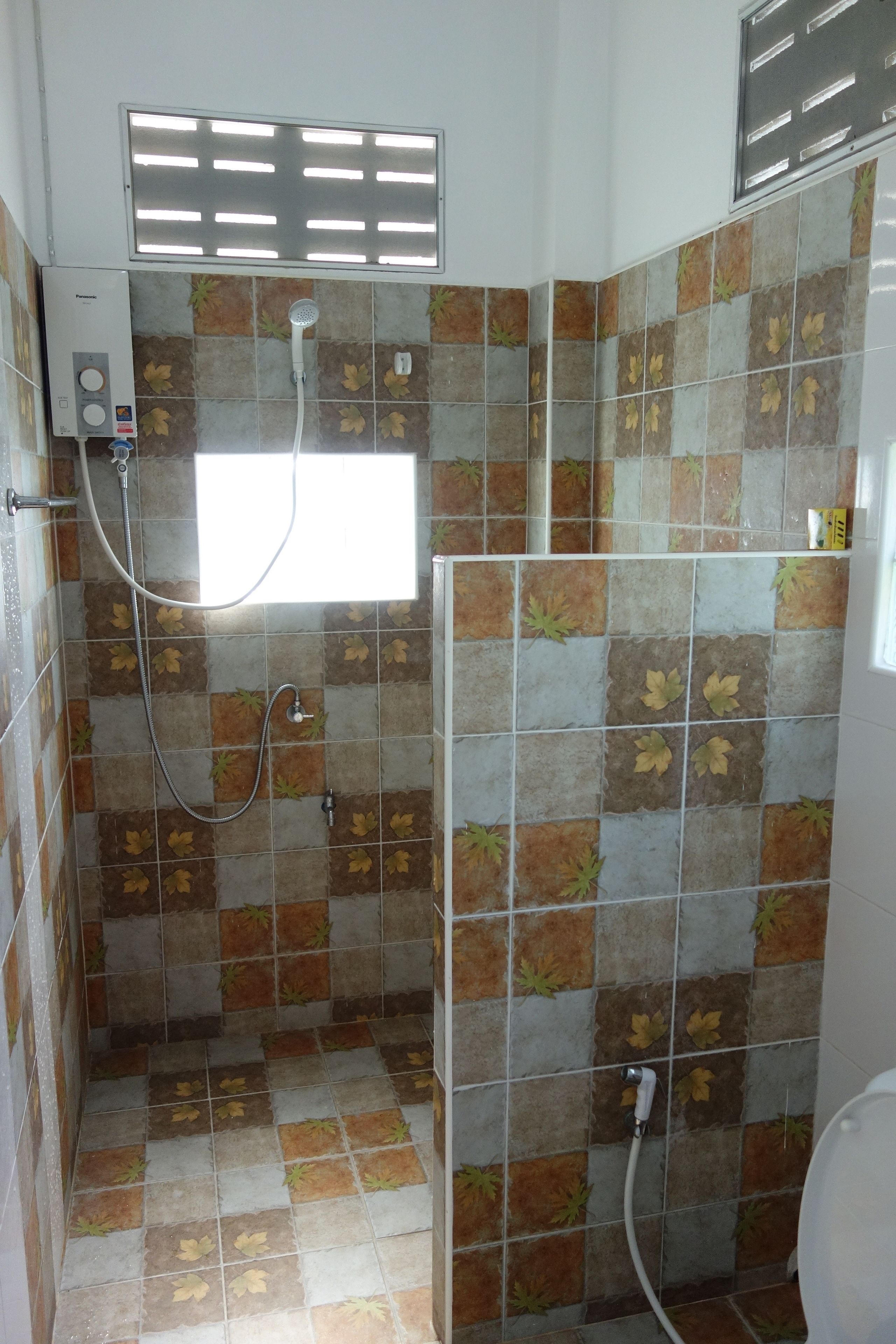 standard bungalow, 1 king bed, partial sea view | bathroom | shower, free toiletries, hair dryer, bidet