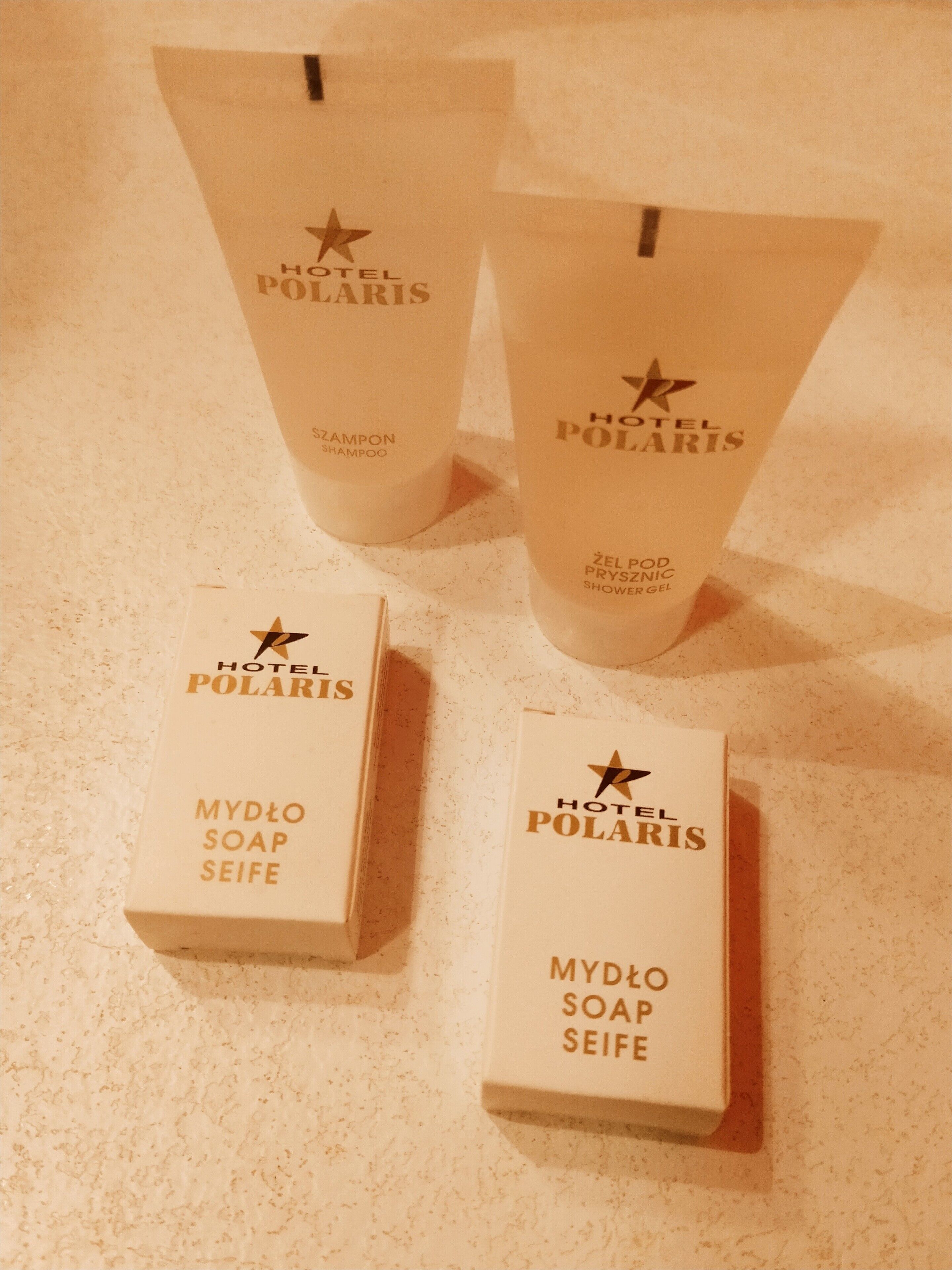 Three Hotel Polaris toiletry items: two shampoo bottles and two soap boxes.