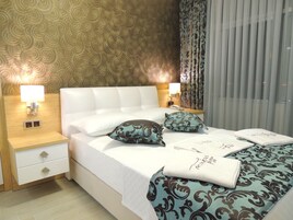 Cubrecamas, colchones Select Comfort y minibar