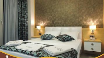 Couette en duvet d'oie, matelas Select Comfort, minibar