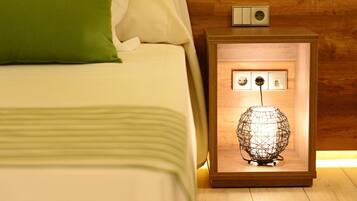 Luxe beddengoed, een gratis minibar, een kluis op de kamer, een bureau