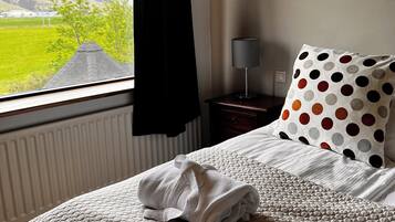 Blackout curtains, soundproofing, free WiFi, bed sheets