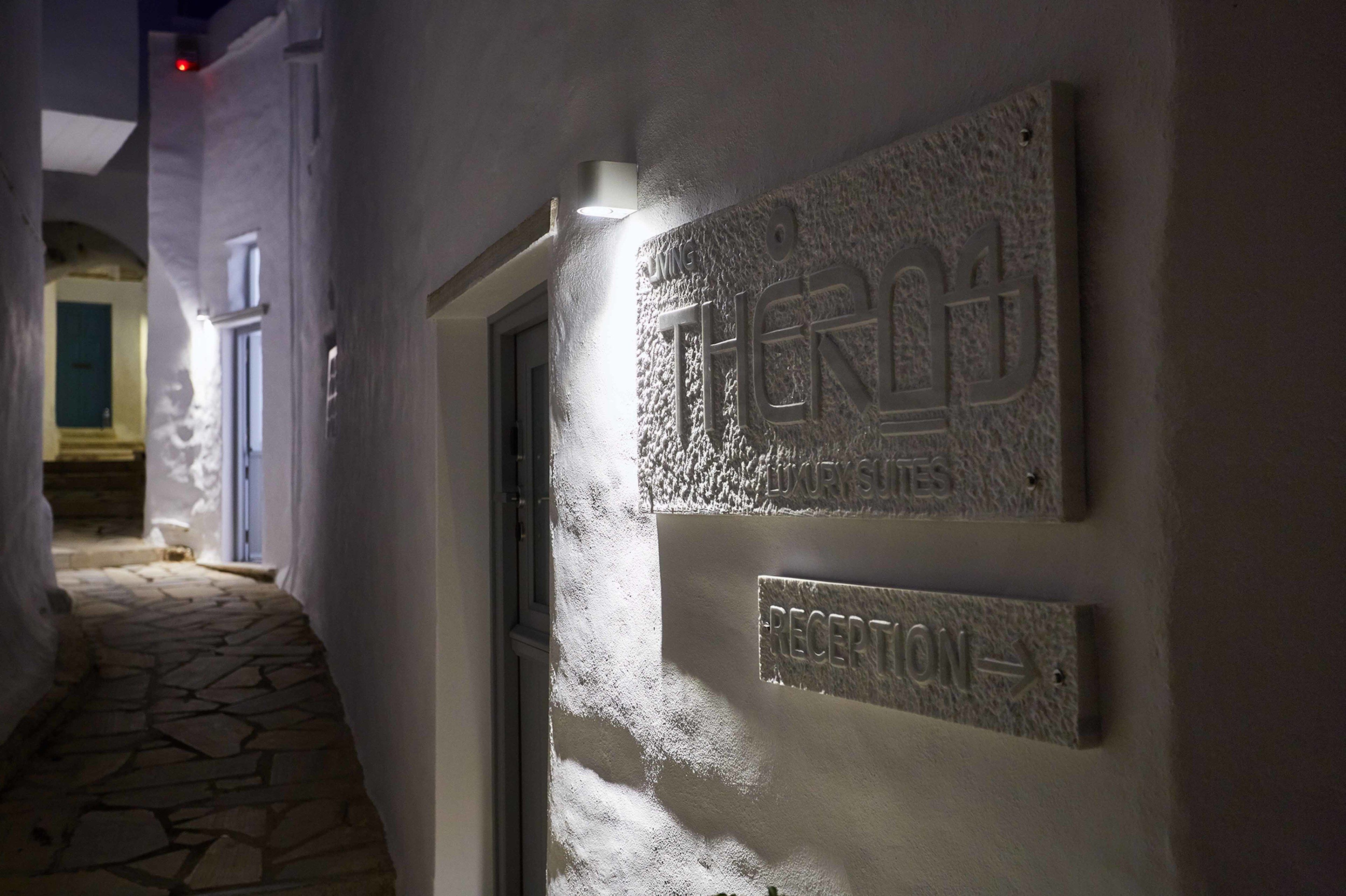 A hallway with a reception sign and a door labeled "RECEPTION."