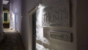 A hallway with a reception sign and a door labeled "RECEPTION."