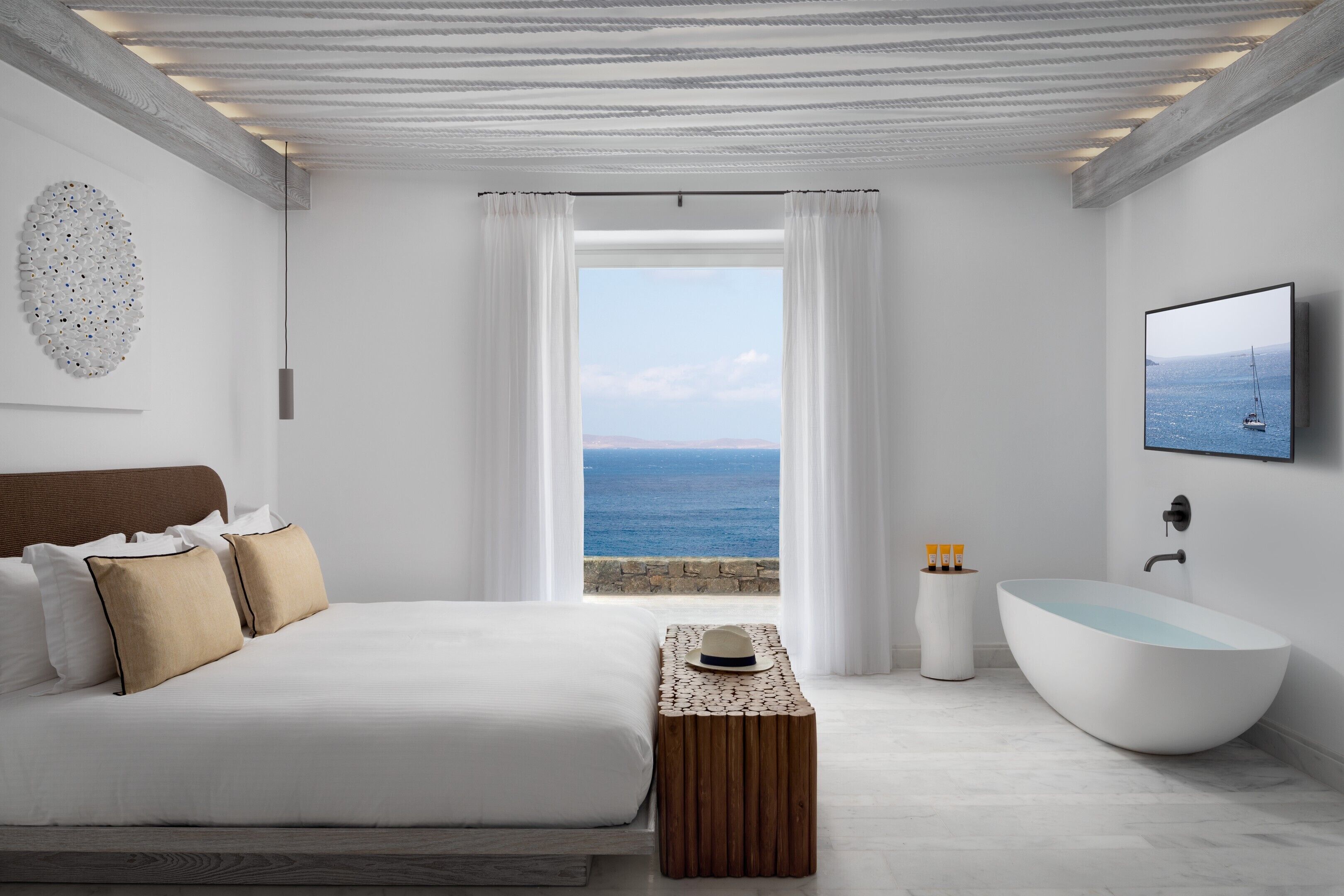 Hypo-allergenic bedding, down duvets, memory-foam beds, minibar