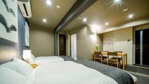 A hotel room with two beds, a desk, and a chair. - RESI STAY Tsubaki (Kyoto)