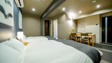 Superior Quad (please see all policies and information about our room before you book) | In-room safe, individually decorated, desk, laptop workspace