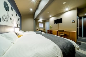 Standard Quad (please see all policies and information about our room before you book) | In-room safe, individually decorated, desk, laptop workspace