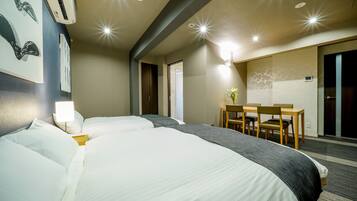 Superior Quad (please see all policies and information about our room before you book) | In-room safe, individually decorated, desk, laptop workspace