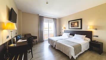 Double Room, Balcony | Minibar, in-room safe, desk, iron/ironing board