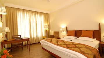 Executive Room | Premium bedding, minibar, in-room safe, desk